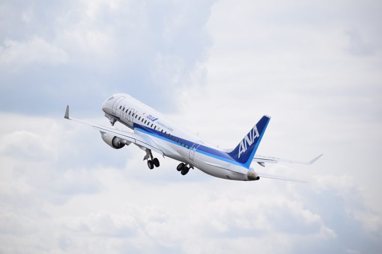 The domestically made regional passenger jet Mitsubishi Regional Jet flies over British skies at the Farnborough International Airshow.