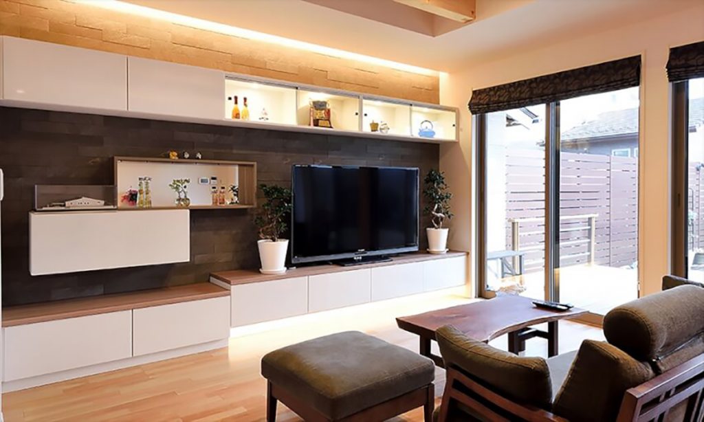 A “dream living room” features Estorage’s custom-built wall storage furniture.