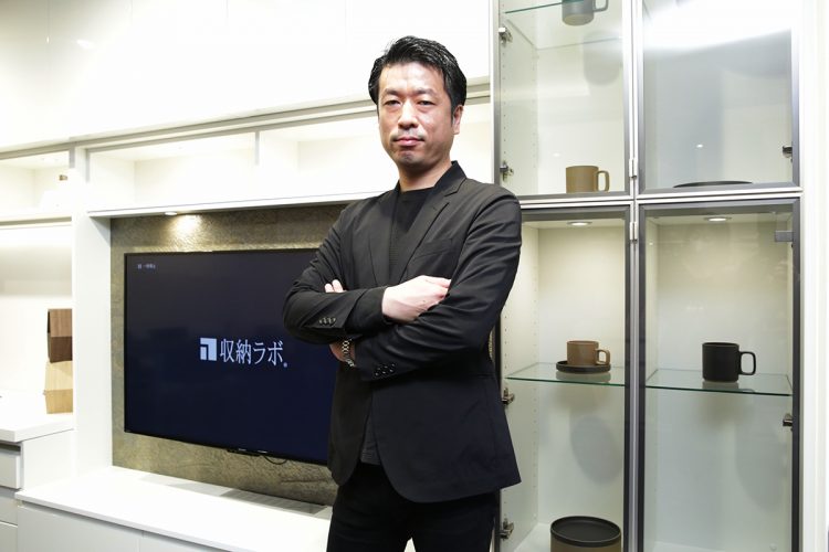 Estorage President Katsunori Yajima poses at the company’s Ginza showroom.